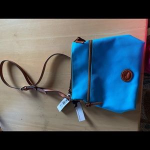 Turquoise blue crossbody purse.